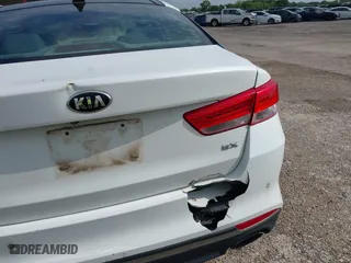 2016 Kia Optima EX with VIN 5XXGU4L38GG013197, listed as a IAAI auction lot 42125301 with 110,128 mi miles. Bid and sale history available at carsss.com. Image 6.