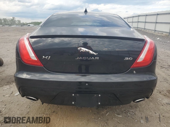 2019 Jaguar XJ R-Sport with VIN SAJWA1C7XK8W21242, listed as a Copart auction lot 56092225 with 47,727 mi miles and Salvage title. Bid and sale history available at DreamBid. Image 6.
