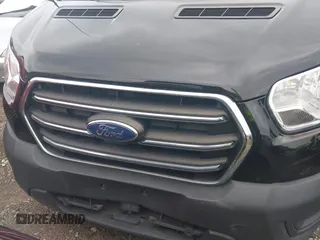 2020 Ford Transit Cargo with VIN 1FTYE1Y80LKB76611, listed as a IAAI auction lot 42445263 with 104,540 mi miles and . Bid and sale history available at DreamBid. Image 6.