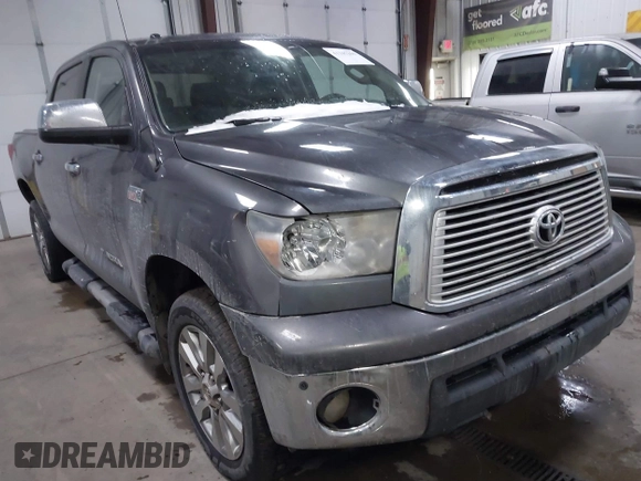 2012 Toyota Tundra 4WD Truck LTD with VIN 5TFHW5F14CX267765, listed as a IAAI auction lot 41345269 with 221,400 mi miles. Bid and sale history available at carsss.com. Image 1.
