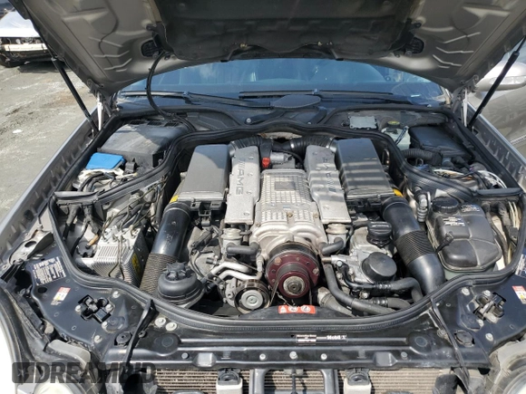 2005 Mercedes-Benz E-Class 5.5L AMG with VIN WDBUF76J15A768563, listed as a Copart auction lot 54874585 with 108,952 mi miles and Salvage Title. Bid and sale history available at carsss.com. Image 12.