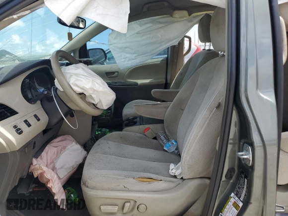 2014 Toyota Sienna LE AAS with VIN 5TDKK3DC5ES423802, listed as a Copart auction lot 69075824 with Not Provided miles and Salvage Title. Bid and sale history available at DreamBid. Image 7.