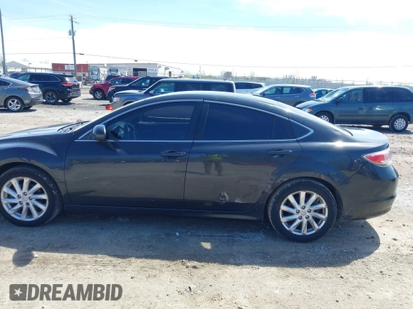 2012 Mazda 6 i Touring with VIN 1YVHZ8DH1C5M36753, listed as a IAAI auction lot 42193590 with 182,716 mi miles and . Bid and sale history available at DreamBid. Image 14.