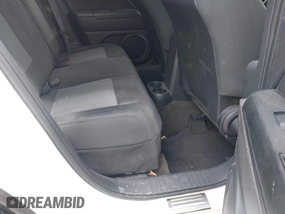 2016 Jeep Patriot Sport with VIN 1C4NJPBA8GD561843, listed as a IAAI auction lot 42027544 with 113,313 mi miles. Bid and sale history available at carsss.com. Image 8.