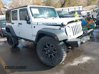 2014 Jeep Wrangler Unlimited Rubicon with VIN 1C4BJWFG2EL264792, listed as a IAAI auction lot 40938380 with 145,886 mi miles. Bid and sale history available at carsss.com. Image 1.