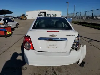 2014 Chevrolet Sonic LTZ with VIN 1G1JE5SH8E4118134, listed as a Copart auction lot 86915364 with 116,484 mi miles and Salvage Title. Bid and sale history available at carsss.com. Image 6.