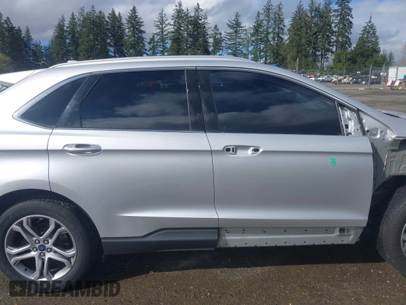 2015 Ford Edge Titanium with VIN 2FMTK4K95FBB10331, listed as a IAAI auction lot 41990356 with 121,337 mi miles. Bid and sale history available at carsss.com. Image 14.