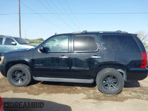2011 Chevrolet Tahoe LT z VIN 1GNSCBE01BR160656, wystawiony jako IAAI lot #41822149 z przebiegiem 248 195 mil mil oraz . Historia ofert i sprzedaży dostępna na DreamBid. Obrazek 13.
