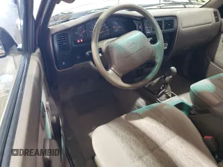 1998 Toyota Tacoma with VIN 4TAPM62N3WZ121359, listed as a Copart auction lot 63473485 with 133,472 mi miles and Salvage title. Bid and sale history available at DreamBid. Image 8.