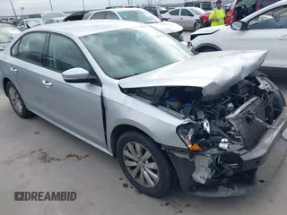 2015 Volkswagen Passat 1.8T Limited Edition with VIN 1VWAT7A30FC002932, listed as a IAAI auction lot 41777501 with 127,979 mi miles. Bid and sale history available at carsss.com. Image 1.