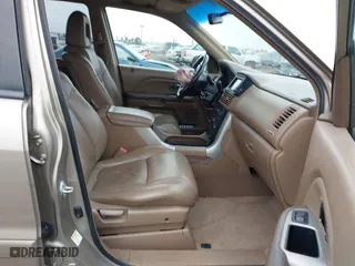 2005 Honda Pilot EX-L with NAVI with VIN 2HKYF18775H543185, listed as a IAAI auction lot 41597576 with 163,377 mi miles. Bid and sale history available at carsss.com. Image 5.