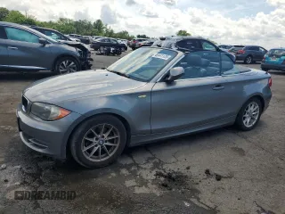 2011 BMW 1 Series 128i with VIN WBAUN1C52BVH82744, listed as a Copart auction lot 63441125 with 129,245 mi miles and Salvage title. Bid and sale history available at DreamBid. Image 1.