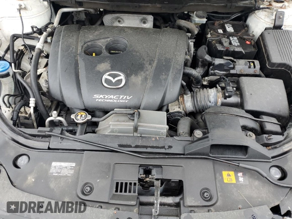 2016 Mazda CX-5 Sport z VIN JM3KE4BY2G0802376, wystawiony jako Copart lot #55976585 z przebiegiem 112 600 mil mil oraz Szkoda całkowita • Salvage title. Historia ofert i sprzedaży dostępna na DreamBid. Obrazek 11.