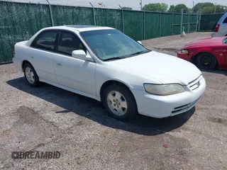 2002 Honda Accord EX z VIN 1HGCG16552A075664, wystawiony jako IAAI lot #42389833 z przebiegiem 279 650 mil mil oraz . Historia ofert i sprzedaży dostępna na DreamBid. Obrazek 1.