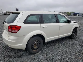 2015 Dodge Journey SE z VIN 3C4PDCABXFT595441, wystawiony jako Copart lot #59181825 z przebiegiem 122 263 mil mil oraz Szkoda całkowita • Salvage title. Historia ofert i sprzedaży dostępna na DreamBid. Obrazek 3.
