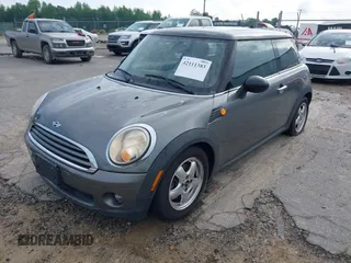 2010 MINI Hardtop with VIN WMWMF3C54ATZ21451, listed as a IAAI auction lot 42111383 with 164,116 mi miles and . Bid and sale history available at DreamBid. Image 2.