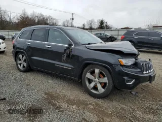 2015 Jeep Grand Cherokee Overland with VIN 1C4RJFCG2FC912328, listed as a Copart auction lot 46112005 with 170,366 mi miles and Salvage Title. Bid and sale history available at carsss.com. Image 4.