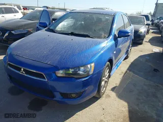 2015 Mitsubishi Lancer ES with VIN JA32U2FU0FU012412, listed as a IAAI auction lot 41766999 with 158,851 mi miles. Bid and sale history available at carsss.com. Image 2.