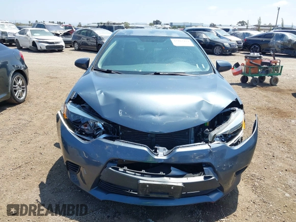 2016 Toyota Corolla L with VIN 5YFBURHE4GP427800, listed as a IAAI auction lot 42182439 with 99,529 mi miles and . Bid and sale history available at DreamBid. Image 12.