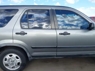2006 Honda CR-V LX with VIN JHLRD68566C009990, listed as a IAAI auction lot 42024486 with 160,835 mi miles and . Bid and sale history available at DreamBid. Image 13.