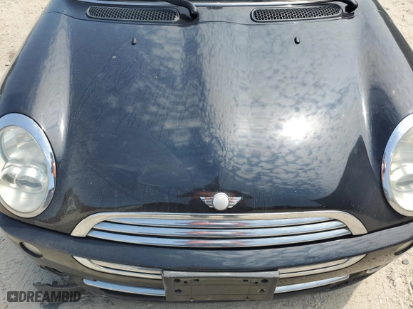 2006 MINI Cooper Convertible with VIN WMWRF33596TG15250, listed as a Copart auction lot 69087234 with 152,716 mi miles and Salvage Title. Bid and sale history available at carsss.com. Image 11.