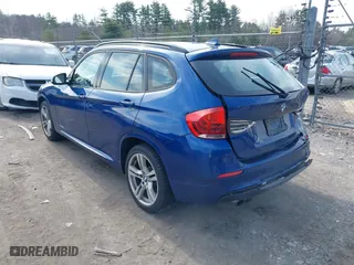 2014 BMW X1 xDrive28i with VIN WBAVL1C58EVY24491, listed as a IAAI auction lot 42022672 with 115,123 mi miles. Bid and sale history available at carsss.com. Image 3.
