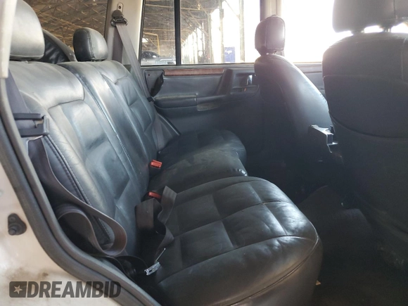 1996 Jeep Grand Cherokee with VIN 1J4EZ78Y9TC104398, listed as a Copart auction lot 69706254 with Not provided miles and Salvage title. Bid and sale history available at DreamBid. Image 10.
