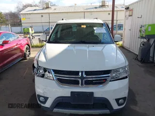 2014 Dodge Journey SXT with VIN 3C4PDCBGXET122969, listed as a IAAI auction lot 41741679 with 151,285 mi miles. Bid and sale history available at carsss.com. Image 12.