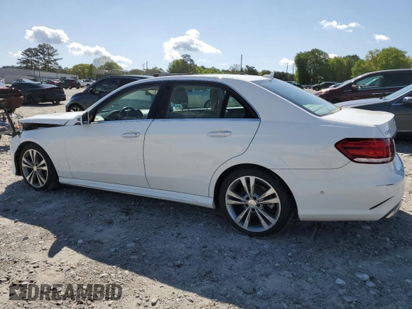 2014 Mercedes-Benz E 350 Sport with VIN WDDHF5KB8EA828799, listed as a Copart auction lot 52600805 with 113,755 mi miles and Salvage Title. Bid and sale history available at DreamBid. Image 2.