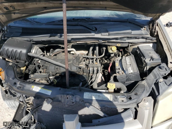 2009 Dodge Grand Caravan SE with VIN 2D8HN44E49R585395, listed as a Copart auction lot 52908795 with 304,111 mi miles and Salvage Title. Bid and sale history available at carsss.com. Image 12.