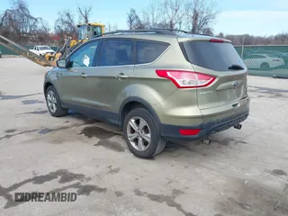 2013 Ford Escape SE with VIN 1FMCU9GX1DUB69236, listed as a IAAI auction lot 41575494 with 122,075 mi miles and . Bid and sale history available at DreamBid. Image 3.