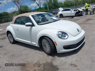2016 Volkswagen Beetle SE with VIN 3VW507AT2GM807003, listed as a IAAI auction lot 42539945 with 53,953 mi miles and . Bid and sale history available at DreamBid. Image 1.