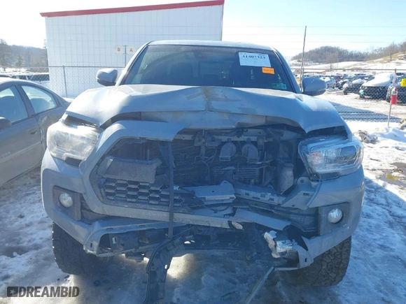 2018 Toyota Tacoma SR with VIN 3TMCZ5AN3JM134218, listed as a IAAI auction lot 41407323 with 121,592 mi miles. Bid and sale history available at carsss.com. Image 6.