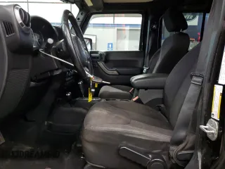 2014 Jeep Wrangler Unlimited Sport with VIN 1C4BJWDG8EL100708, listed as a Copart auction lot 57297245 with 170,862 mi miles and Clean Title. Bid and sale history available at DreamBid. Image 7.
