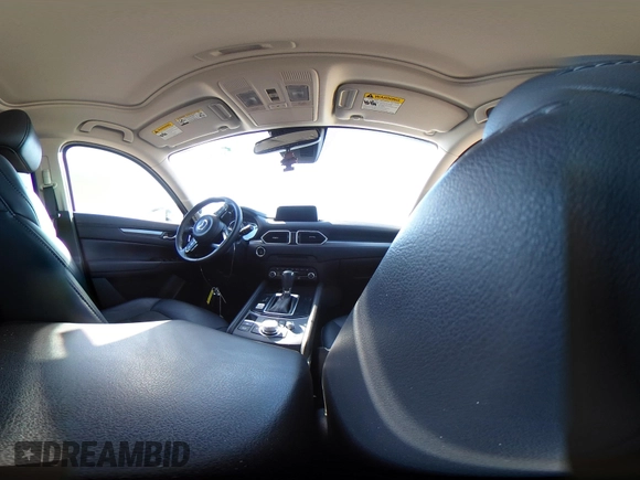 2020 Mazda CX-5 Touring z VIN JM3KFBCM2L0848233, wystawiony jako IAAI lot #42189719 z przebiegiem 80 893 mil mil oraz . Historia ofert i sprzedaży dostępna na DreamBid. Obrazek 19.