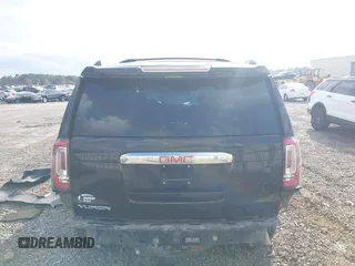 2015 GMC Yukon Denali with VIN 1GKS1CKJ8FR612971, listed as a IAAI auction lot 41519689 with 197,003 mi miles. Bid and sale history available at carsss.com. Image 16.
