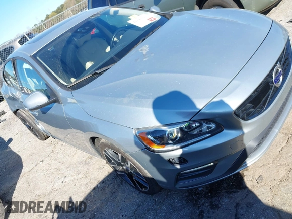 2018 Volvo S60 Dynamic z VIN YV126MFL4J2451903, wystawiony jako IAAI lot #41844843 z przebiegiem 118 026 mil mil oraz . Historia ofert i sprzedaży dostępna na DreamBid. Obrazek 1.