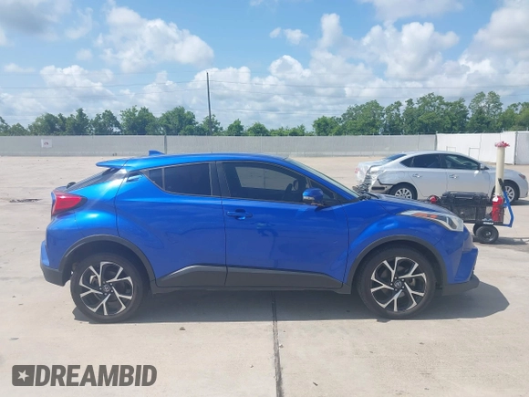 2018 Toyota C-HR XLE z VIN NMTKHMBX5JR057407, wystawiony jako IAAI lot #42363412 z przebiegiem 155 673 mil mil oraz . Historia ofert i sprzedaży dostępna na DreamBid. Obrazek 13.