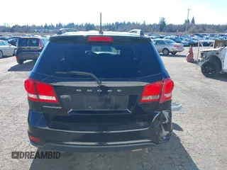 2019 Dodge Journey SE z VIN 3C4PDCBB1KT859686, wystawiony jako IAAI lot #41548860 z przebiegiem 68 955 mil mil oraz . Historia ofert i sprzedaży dostępna na DreamBid. Obrazek 16.