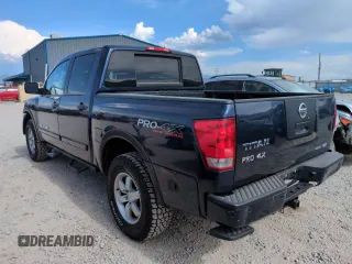 2011 Nissan Titan Pro-4X with VIN 1N6BA0EC3BN322837, listed as a Copart auction lot 60617675 with 196,657 mi miles and Salvage title. Bid and sale history available at DreamBid. Image 2.