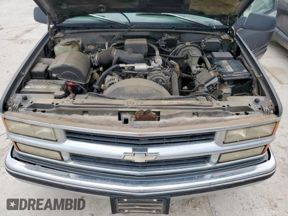 1999 Chevrolet Suburban with VIN 1GBEC16R0XJ434453, listed as a Copart auction lot 54711725 with 179,597 mi miles and Clean title. Bid and sale history available at DreamBid. Image 12.