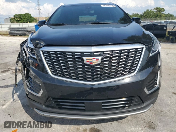 2022 Cadillac XT5 FWD Premium Luxury z VIN 1GYKNCRS7NZ101131, wystawiony jako Copart lot #56365065 z przebiegiem 74 168 mil mil oraz Szkoda całkowita • Salvage title. Historia ofert i sprzedaży dostępna na DreamBid. Obrazek 5.