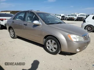 2006 Kia Spectra EX with VIN KNAFE121565364950, listed as a Copart auction lot 48860895 with 209,615 mi miles and Salvage Title. Bid and sale history available at DreamBid. Image 4.