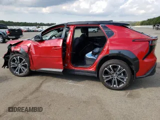2023 Subaru Solterra Premium z VIN JTMABABA9PA001288, wystawiony jako Copart lot #71237833 z przebiegiem Nie podano mil oraz . Historia ofert i sprzedaży dostępna na DreamBid. Obrazek 2.