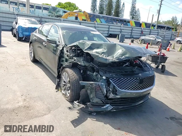 2020 Cadillac CT5 Premium Luxury z VIN 1G6DN5RK5L0141688, wystawiony jako Copart lot #54992665 z przebiegiem 66 058 mil mil oraz Nie do naprawy • Non repairable. Historia ofert i sprzedaży dostępna na DreamBid. Obrazek 13.