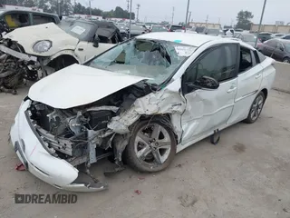 2016 Toyota Prius Four with VIN JTDKARFU4G3022953, listed as a IAAI auction lot 34510526 with Not provided miles and . Bid and sale history available at DreamBid. Image 6.