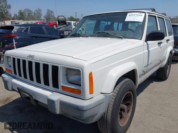 2000 Jeep Cherokee z VIN 1J4FT48S8YL214074, wystawiony jako IAAI lot #42577235 z przebiegiem 287 868 mil mil oraz . Historia ofert i sprzedaży dostępna na DreamBid. Obrazek 6.