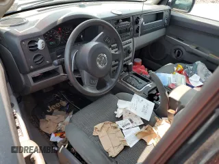 2006 Jeep Commander z VIN 1J8HG48K16C195599, wystawiony jako Copart lot #59402935 z przebiegiem 184 157 mil mil oraz Szkoda całkowita • Salvage title. Historia ofert i sprzedaży dostępna na DreamBid. Obrazek 8.
