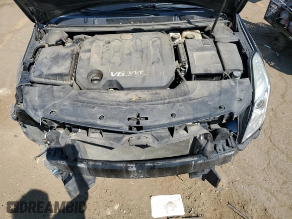2013 Cadillac XTS Luxury z VIN 2G61P5S35D9172074, wystawiony jako Copart lot #71996124 z przebiegiem 122 338 mil mil oraz Szkoda całkowita • Salvage title. Historia ofert i sprzedaży dostępna na DreamBid. Obrazek 13.