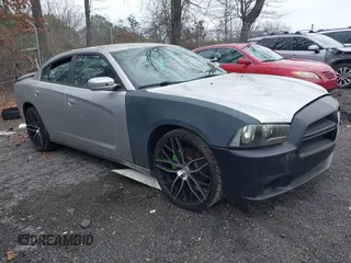 2011 Dodge Charger Police with VIN 2B3CL1CT4BH600830, listed as a IAAI auction lot 41530576 with 287,349 mi miles and . Bid and sale history available at DreamBid. Image 1.